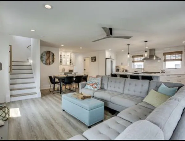 Open floor plan from the living room through the dining area to the kitchen