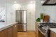 Kitchen with a marble backsplash, gas range, and oak cabinetry, from Seaboard's Margate, NJ renovation